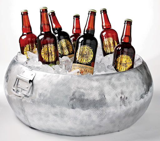 Roost’s Algarve hammered-aluminum party bucket is perfect for iced bottles of locally brewed Flossmoor Station beer (or, sans ice, magazines or towels), 18 inches across, $170, at Jayson Home & Garden. 