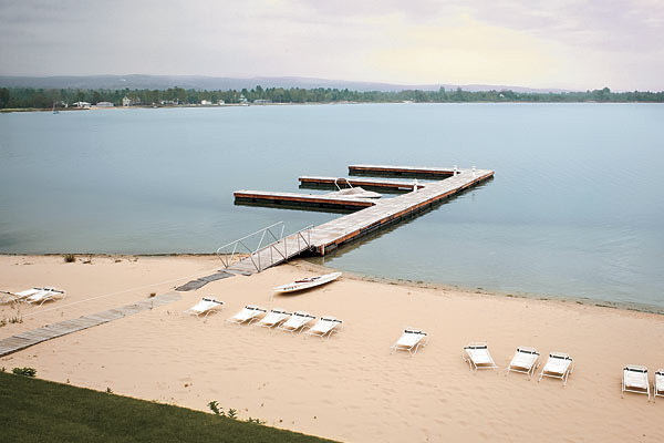 The beach and pier at Portage Lake