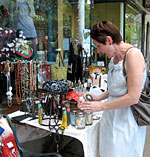 A customer browsing items at the Evanston Sidewalk Sale