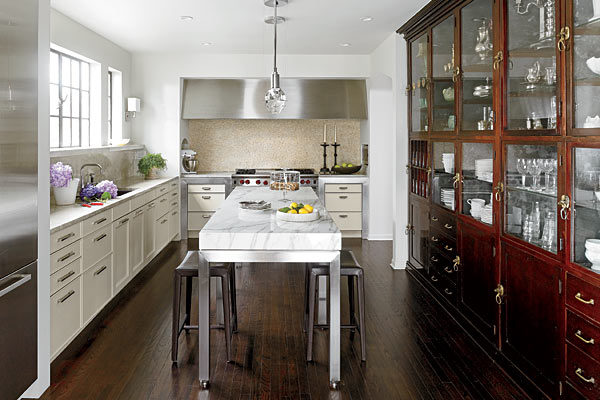 A back wall of the house was knocked out to enlarge the kitchen beyond its original ten-foot-square dimensions and accommodate the 13-foot-long antique humidor.