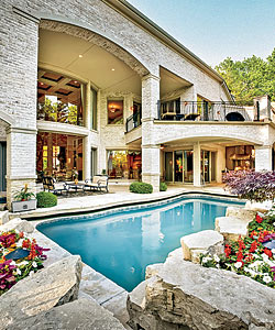 The pool area, surrounded by flowers