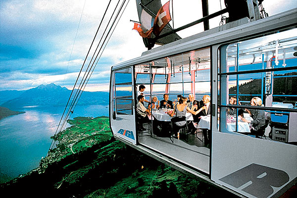 Diners in a cable car near the top of Mount Rigi