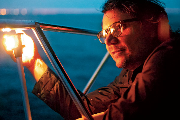 Wilco's Jeff Tweedy in a fishing boat on Lake Michigan