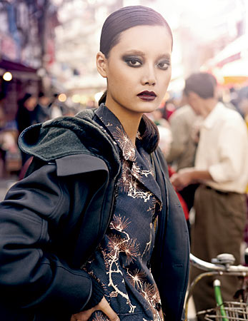 REED KRAKOFF parka, and DRIES VAN NOTEN jacket and skirt