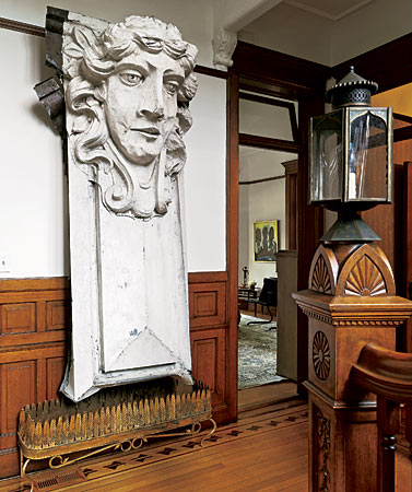 Don’t be afraid of drama—or of playing with scale. Visitors to this North Shore house are welcomed by a nine-foot-tall zinc face (salvaged from a demolished building) hung over an antique jardinière. This statement piece has almost become a member of the family—the homeowners call it Washington.