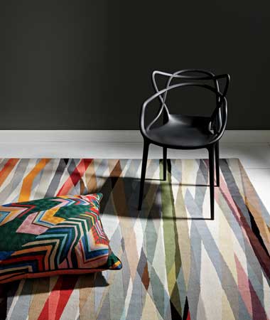 Philippe Starck’s polycarbonate Masters chair is one chic seat, $224, at Orange Skin. Tibetan wool Carnival rug by Paul Smith, from $116 per square foot, at The Rug Company. Abstract Idea wool and cotton chevron-patterned crewel pillow, 24 by 30 inches, $118, at Anthropologie. On walls: Benjamin Moore Amherst Gray