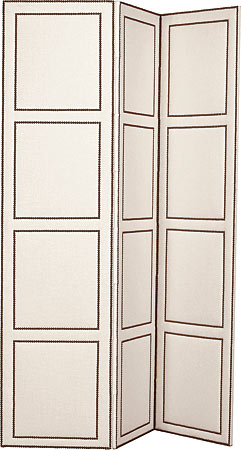 An upholstered folding screen with nail-head trim by Victoria Hagan