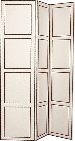 An upholstered folding screen with nail-head trim by Victoria Hagan