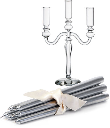 Glass lightens up the traditional candelabrum and silvery candles