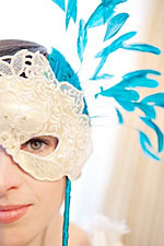 A woman with a masquerade mask