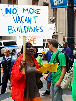 At a July 18 event on LaSalle Street, people march in support of the Keep Chicago Renting Ordinance.