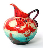 A colorful antique pitcher