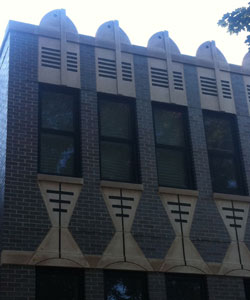 A close-up of a home with a fish-shaped façade