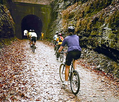 The scenic Tunnel Hill State Trail, a 45-mile bicycle route, starts in Harrisburg, Illinois.