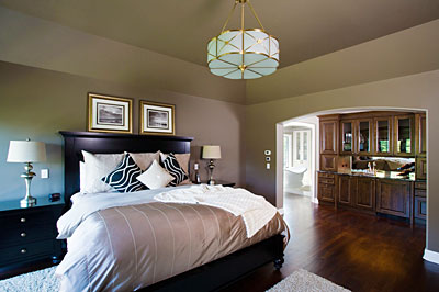 A bedroom in the Orren Pickell Building Group designed home