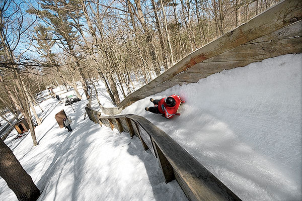 Luging down a hill