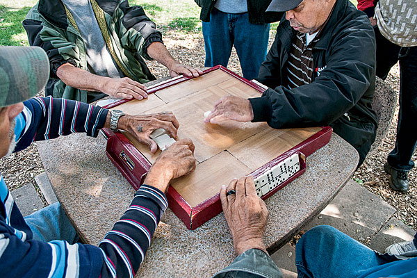 Residents playing dominoes in the park