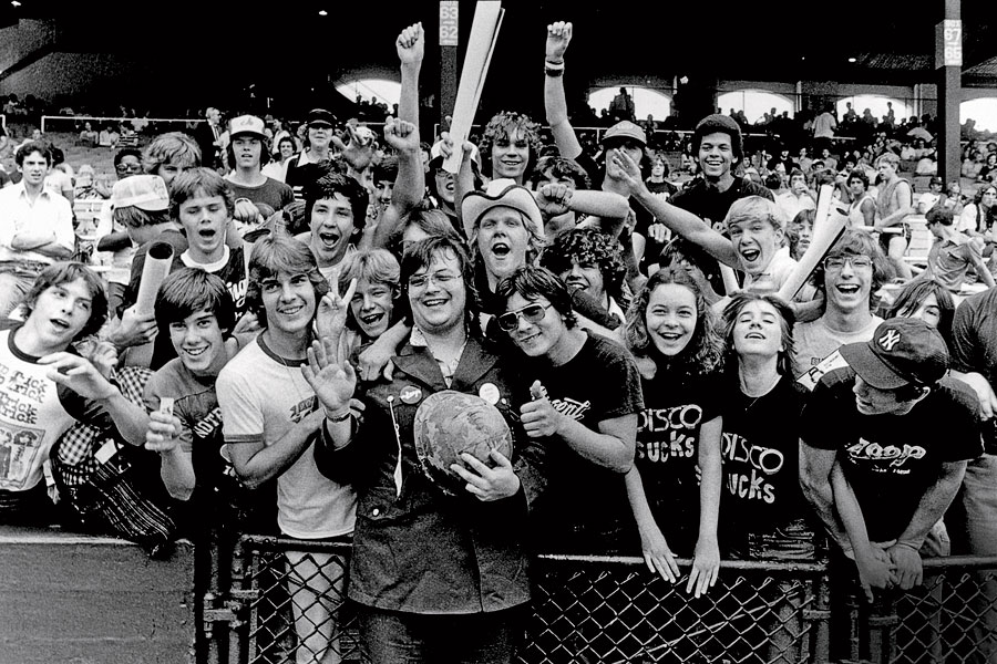 Antidisco fans crowded around Dahl before the first game.