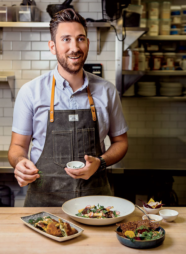 Dan Snowden preparing fry bread stuffed with dill, sorrel, and spring onions; corn-and-shiitake-filled dumplings; beet tartare with flax seed crisps