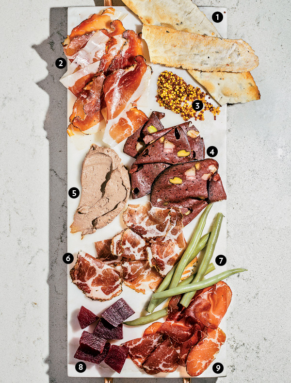 Rosemary and Parmesan Flatbread, Speck, Whole seed mustard, Blood mortadella, Duck liver mousse, Wagyu bresaola, Dilly beans, Spiced beets, and Coppa