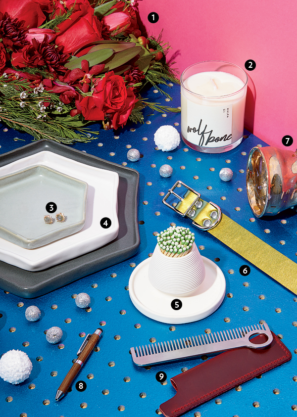 Winter bouquet, soy wax candle, labradorite and cubic zirconia earrings, stoneware plates, ceramic match strike, nylon dog collar with nickel-plated hardware, ceramic cup, reclaimed wood ballpoint pen and touchscreen stylus, and a tainless steel and titanium comb with leather sheath