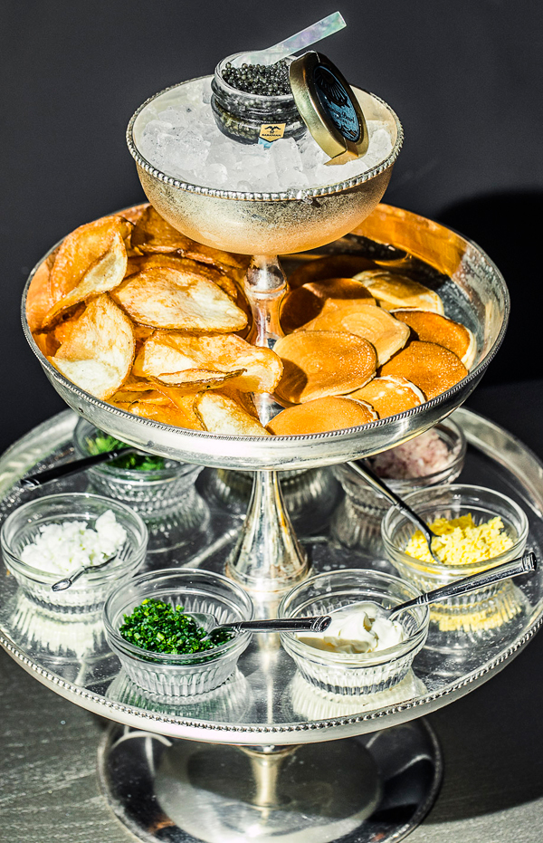 Iranian Pearl Asetra 000 caviar, chips, and garnishes at BLVD