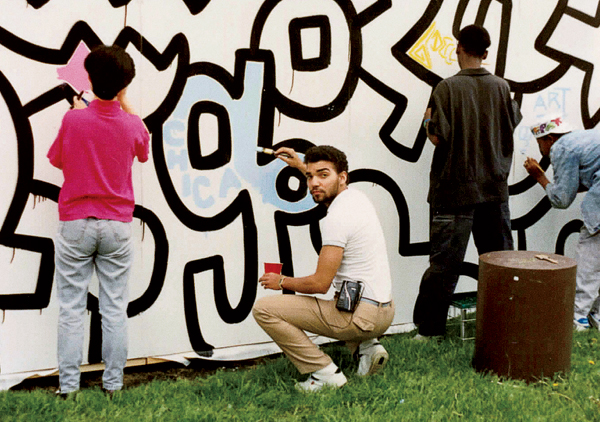 CPS students filling in the mural