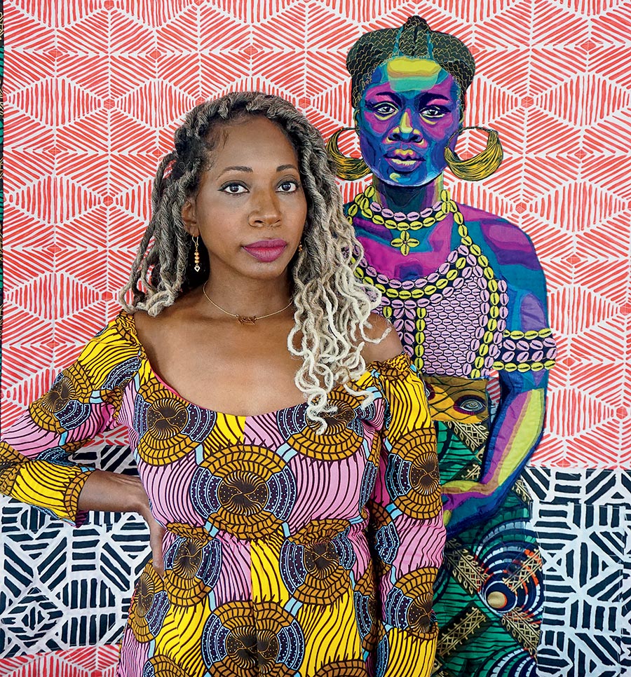 Bisa Butler in front of ‘Dahomey Amazon,’ 2020
