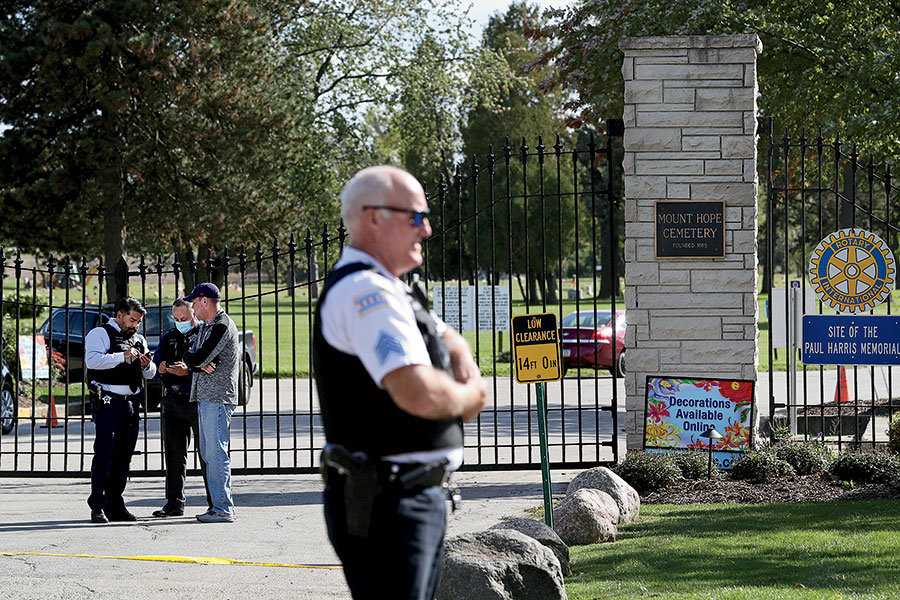 Police officers outside the main entrance shortly after the September 30 shooting