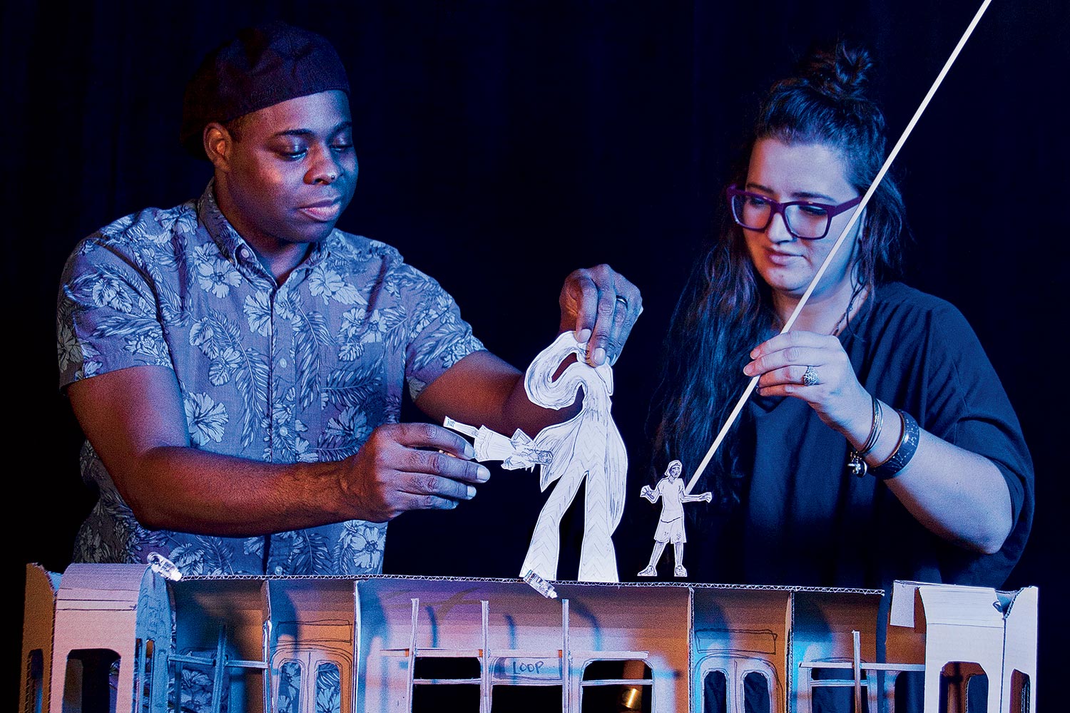 Director Jerrell L. Henderson and puppet and set designer Caitlin McLeod work with early models for their new production, ‘Diamond’s Dream.’