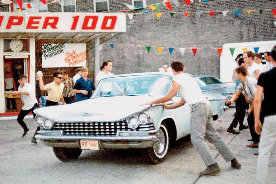 A block from a King rally, Kleina photographed white agitators vandalizing the car of a Black family.