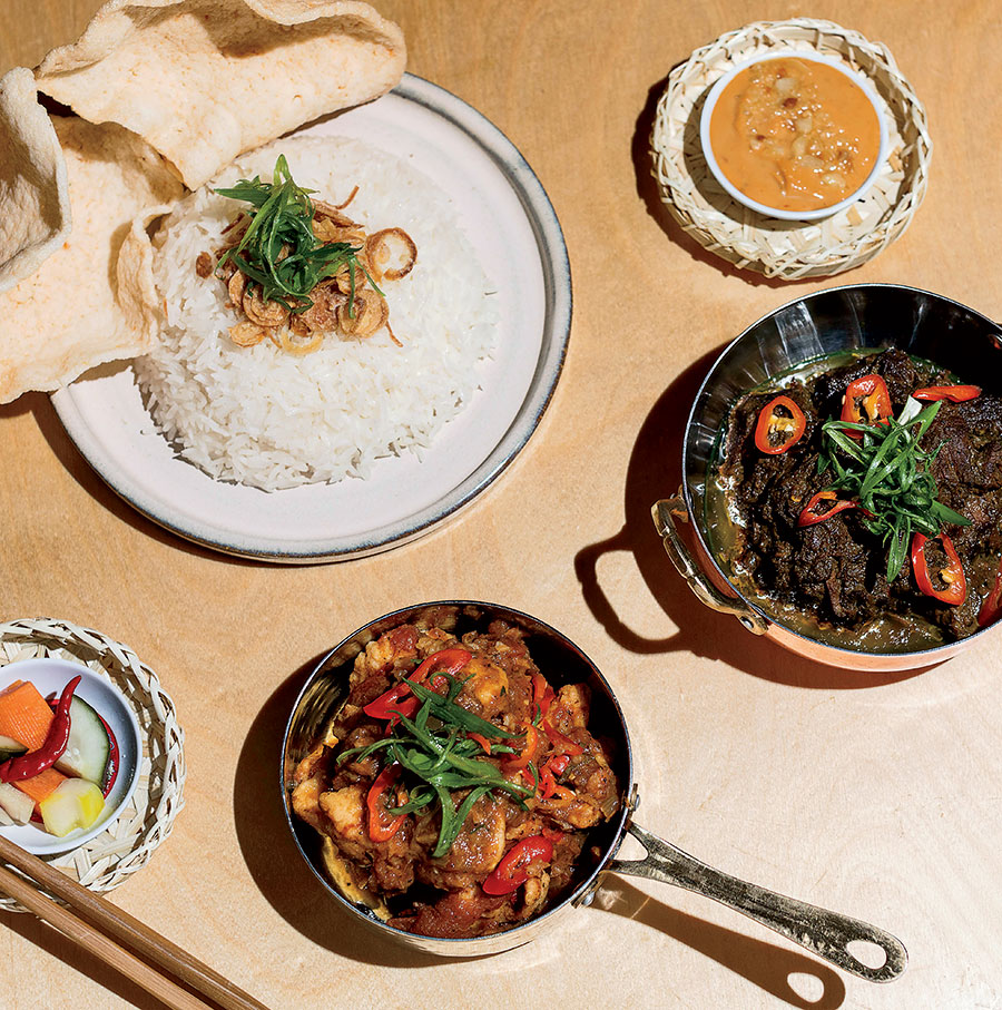 Rice and shrimp chips, beef rendang, and ayam rica-rica