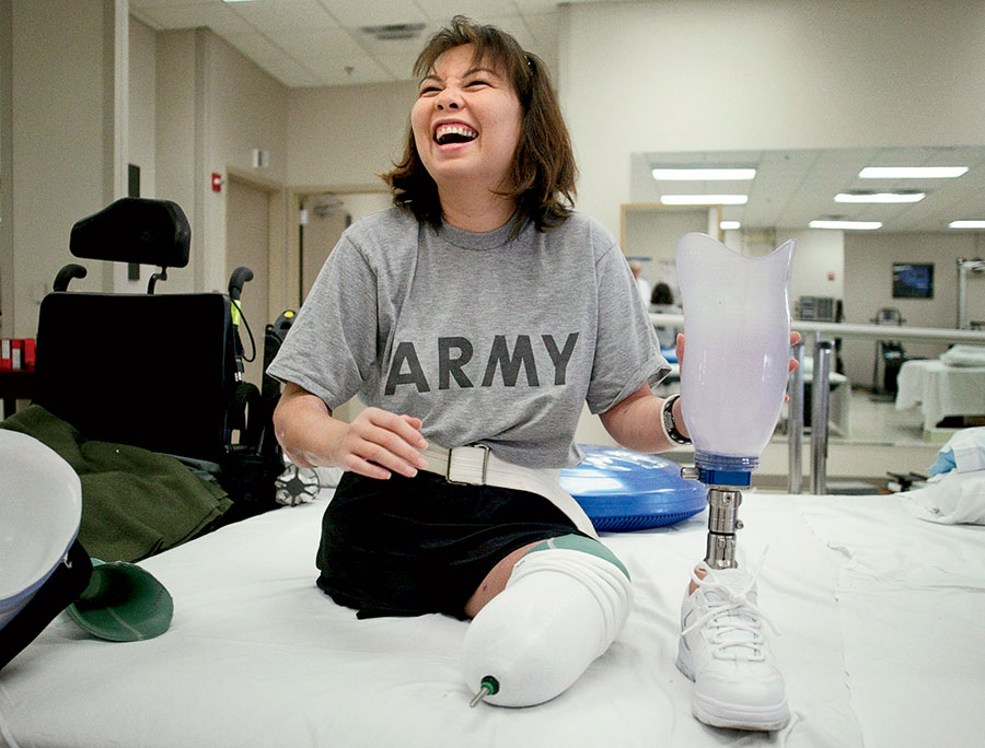 Duckworth, here with one of her prosthetic legs four months later.