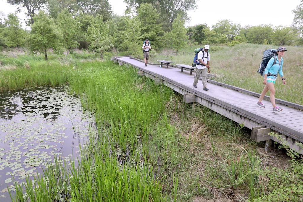 Hikers behind the South Shore Cultural Center