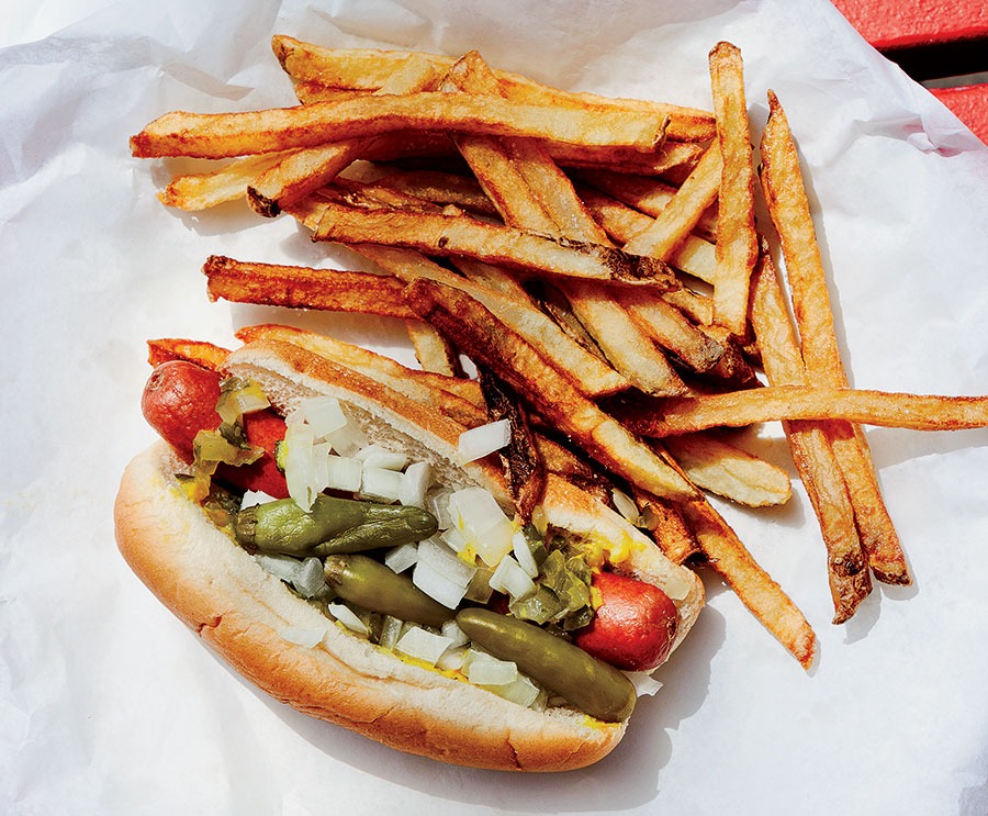 A Chicago-style hot dog and fries