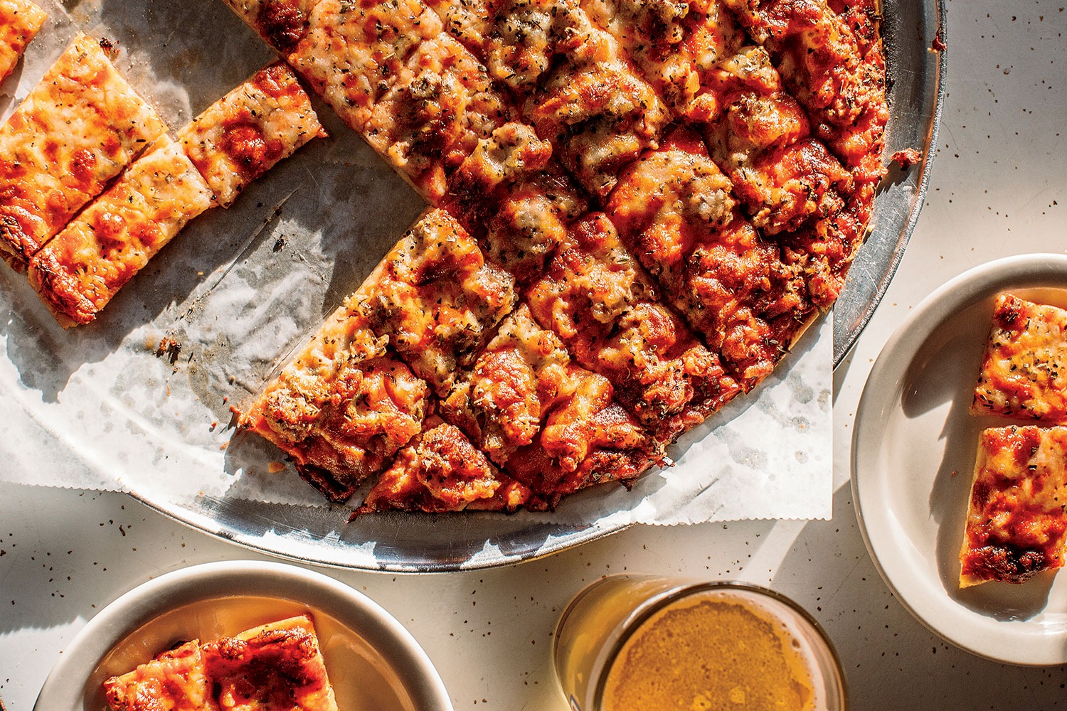 Thin Crust Sausage Pizza at Vito & Nick’s Pizzeria