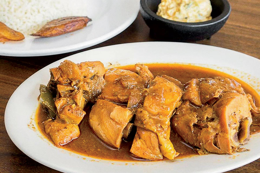 Belizean stewed chicken at Garifuna Flava