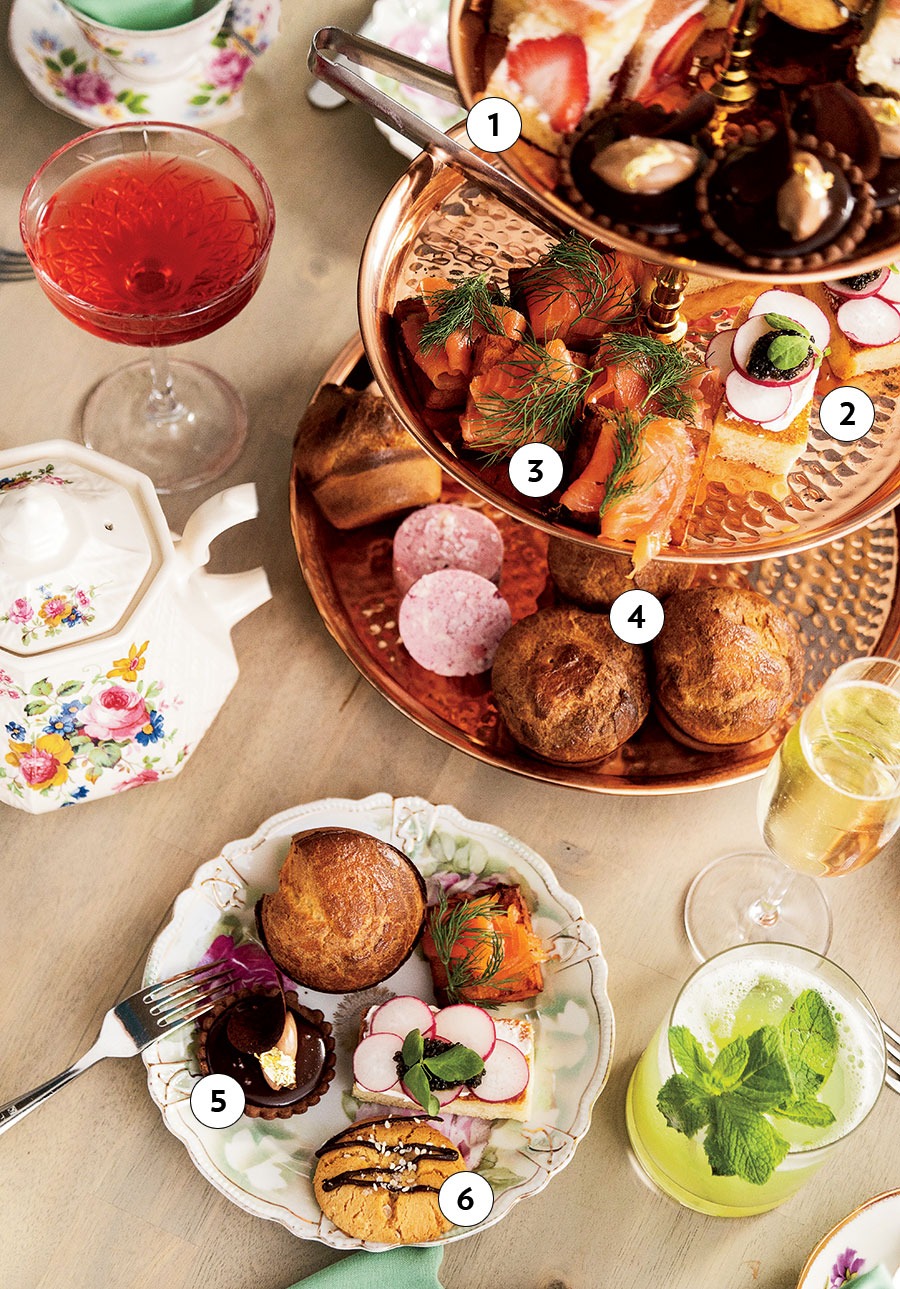 Fraisier Cake Bites, Traditional Tea Sandwich, Smoked Salmon Panisse, Kostali Popovers, Sea Salt and Dark Chocolate Tart, and Tahini Shortbread Cookies With Dark Chocolate and Sesame Seeds