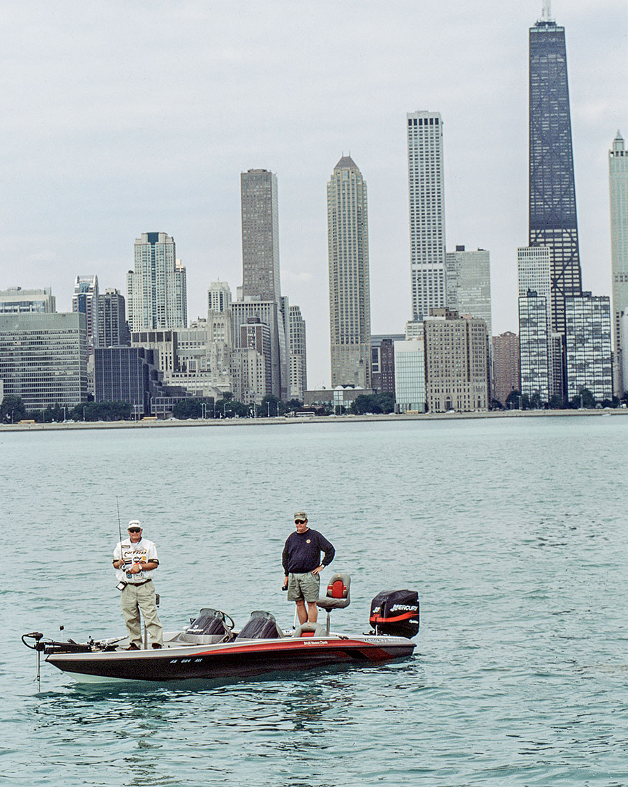 Eventual winner Woo Daves (left) fishing against one of the more picturesque backdrops of the 2000 Bassmaster Classic