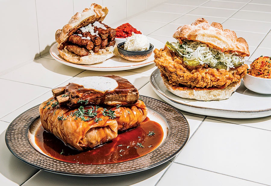 Cevapi, fried chicken sandwich, and sarma from Kiosk Balkan Street Food