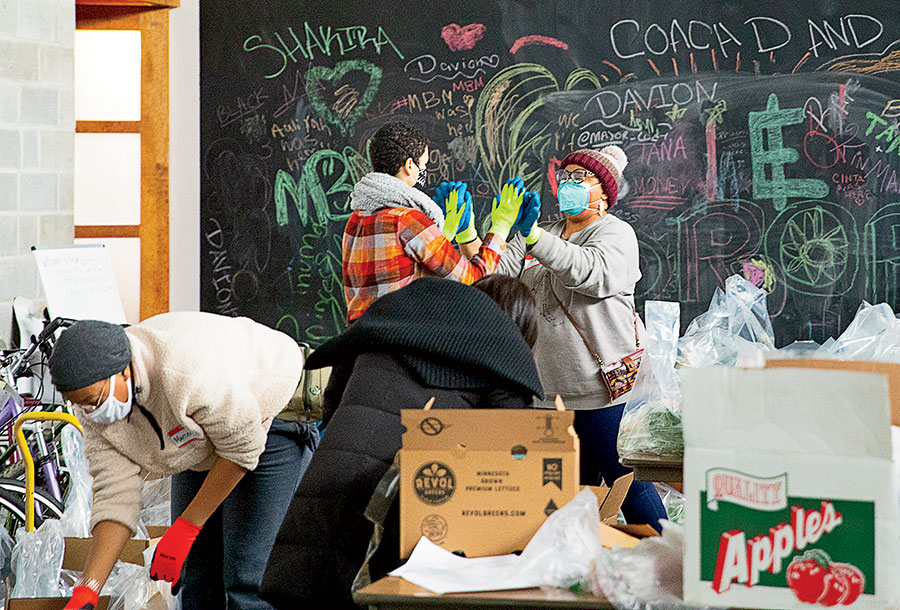 Volunteers working in a food bank