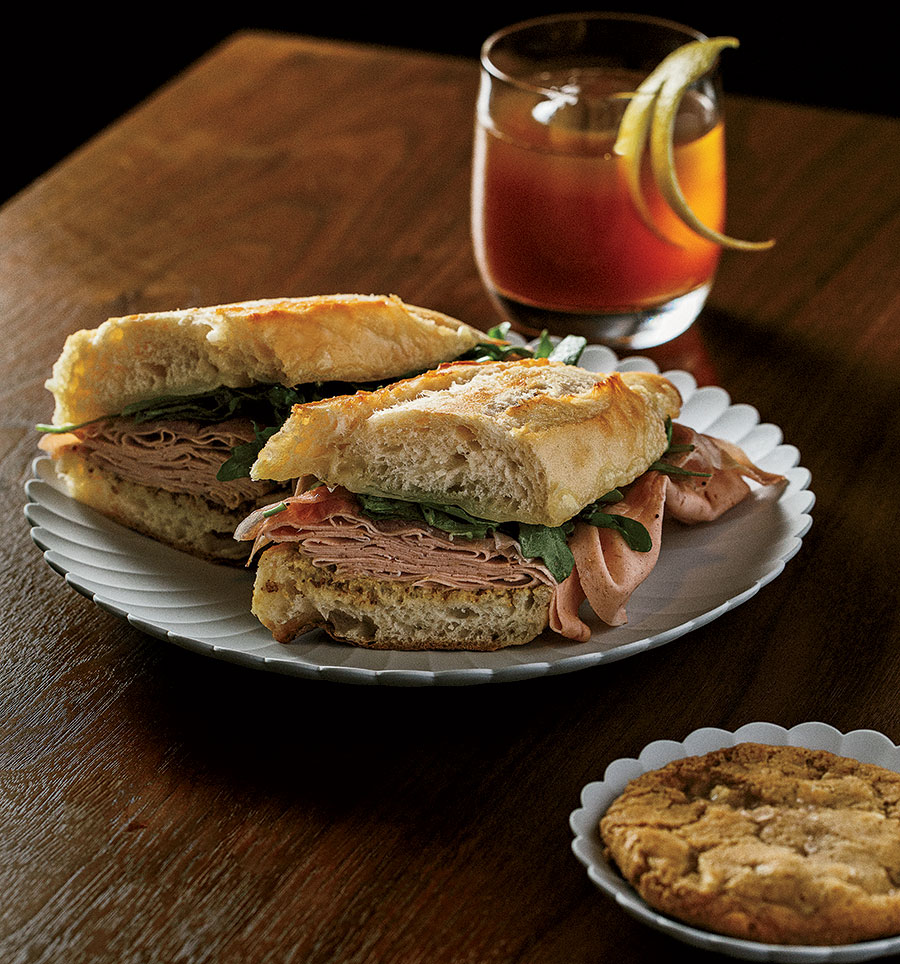 A sandwich, drink, and cookie from Oriole