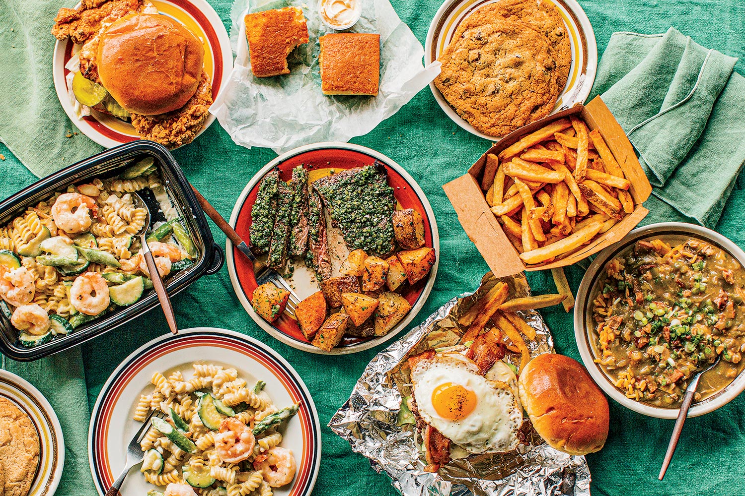 Clockwise from top left: Fried chicken sandwich, cornbread, Brown Sugar Bakery cookies, fries, chicken gumbo, Good Afternoon double cheeseburger, rotini, skirt steak