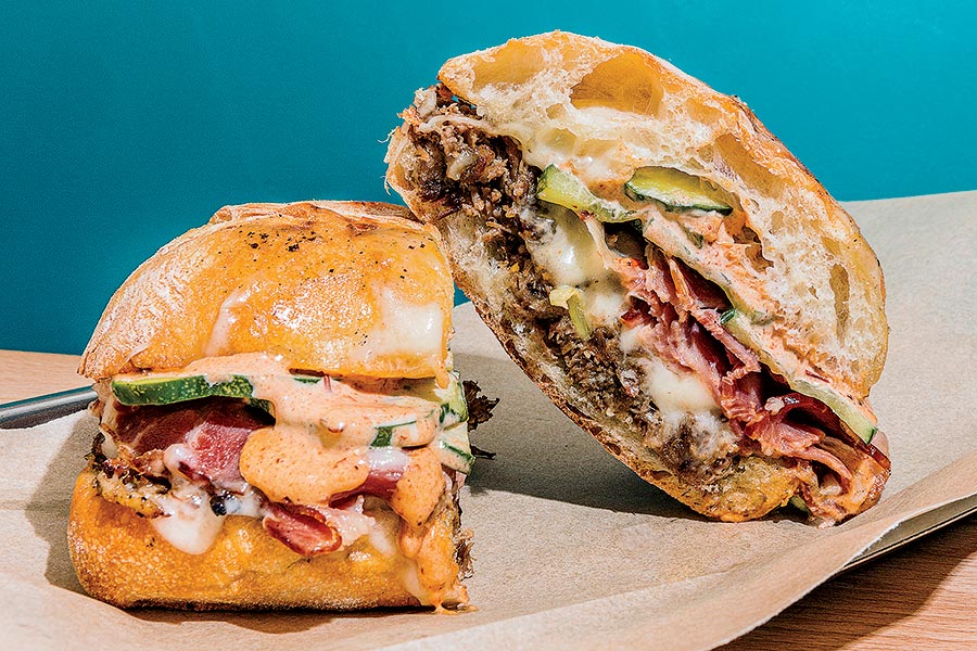 https://www.chicagomag.com/wp-content/uploads/2022/04/C202205-T-TriBeccas-Sandwich-Shop-Cubano.jpg