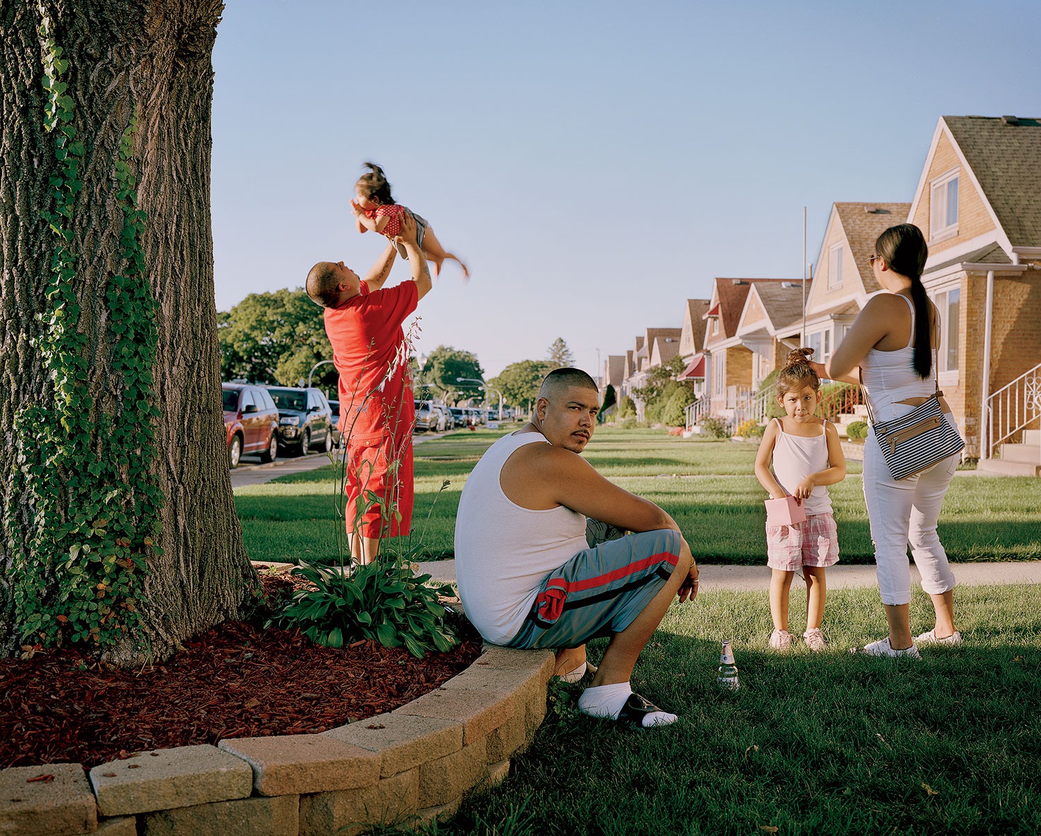 A family in front of their house