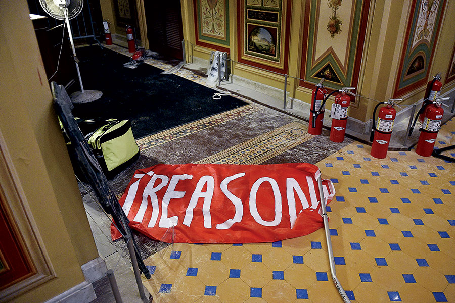 An abandoned "Treason" sign on the floor of the Capitol