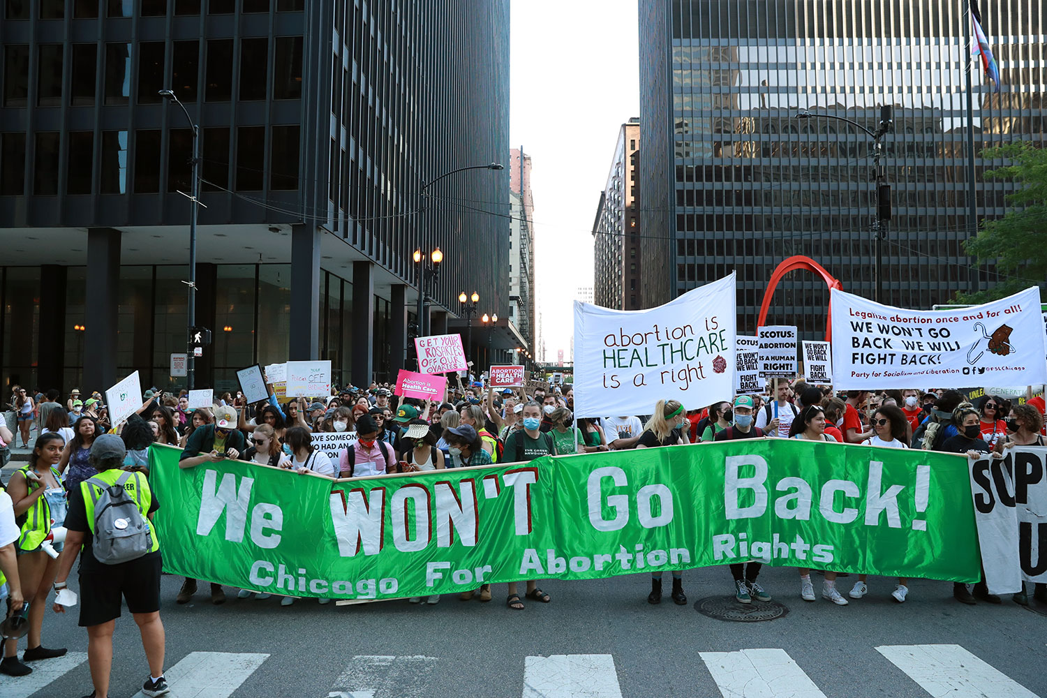 People rally in Chicago's Federal Plaza on Friday, June 24, 2022, in reaction to the Supreme Court overturning Roe v. Wade.