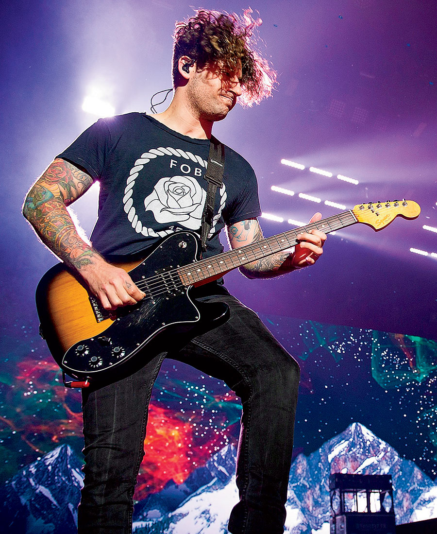 Joe Trohman performing in July