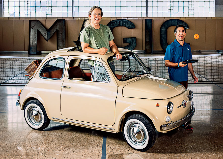 Stuart Grannen (left) and Robby Baum posing by a 1966 Fiat 500