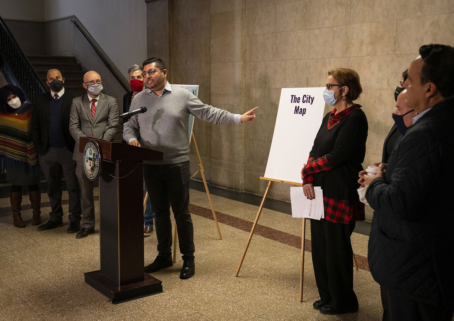 Ald. Carlos Ramirez-Rosa (35th), and members of the Chicago City Council Latino Caucus hold a press conference calling for transparency in the redistricting map process in December 2021.